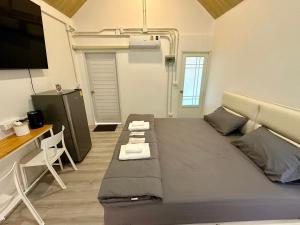 TV a/nebo společenská místnost v ubytování The Nack Resort & Pool Villa บางบัวทอง