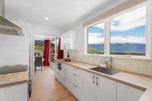 Kuchyň nebo kuchyňský kout v ubytování Glasgows Hillcrest Lodge + 8 fotografií