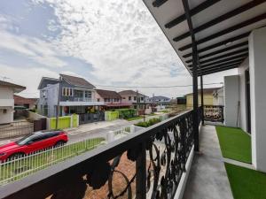 A balcony or terrace at VegeGarden Cozy Home @Ipoh Town Center