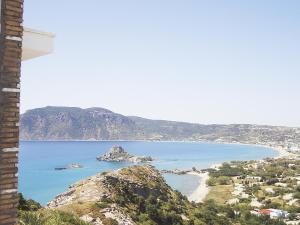 a view of a beach and the ocean at Panorama Studios in Kefalos