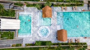 an overhead view of a pool at a resort at Mandala Cham Bay Mui Ne in Phan Thiet