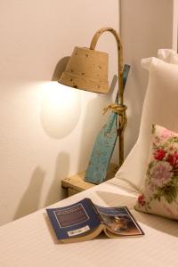 A bed or beds in a room at Lindos Allure Villa with Jacuzzi and Acropolis view!!!