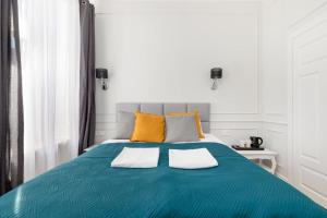 Posteľ alebo postele v izbe v ubytovaní Lwowska 9 - Cozy & Comfortable Studio by Noclegi Renters