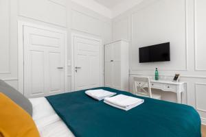 Posteľ alebo postele v izbe v ubytovaní Lwowska 9 - Cozy & Comfortable Studio by Noclegi Renters