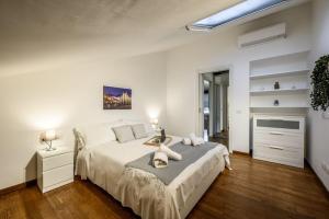 Letto o letti in una camera di Buenos Aires' Nest - 10 minutes from Duomo with terrace