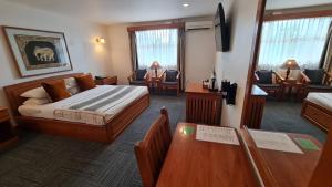Giường trong phòng chung tại Winner Inn