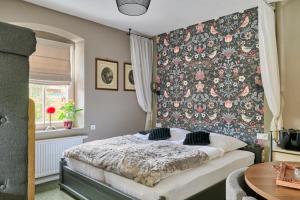Postel nebo postele na pokoji v ubytování Neidorf Inn