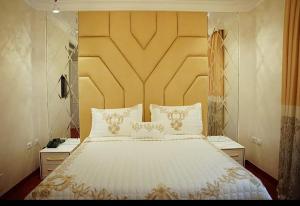 Letto o letti in una camera di Hotel Eiffel