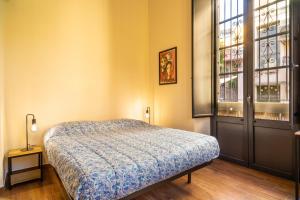 Ένα ή περισσότερα κρεβάτια σε δωμάτιο στο Casa Yasmina