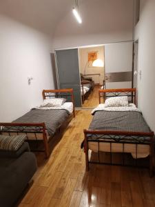 Posteľ alebo postele v izbe v ubytovaní Sewa Apartments