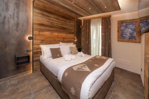 Postel nebo postele na pokoji v ubytování Avalanche - Alpine Boutique Hotel
