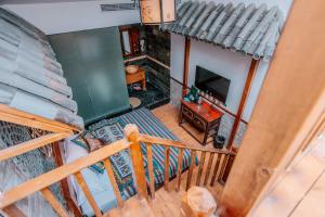 Sjónvarps- og/eða afþreyingartæki á 26Life Yunnan Ethnic Creative Inn