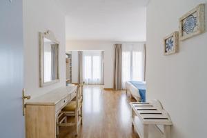 Kama o mga kama sa kuwarto sa Hostal HPC Porto Colom