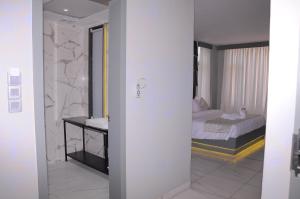 Postel nebo postele na pokoji v ubytování NT Hotels and Resorts Akridha