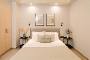Säng eller sängar i ett rum på Phaedrus Living: City Center Zenonos Suite