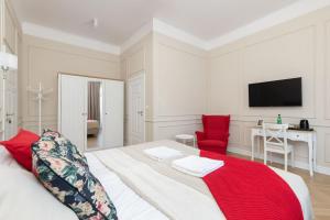 Televízia a/alebo spoločenská miestnosť v ubytovaní Lwowska 9 - Cozy & Comfortable Studio by Noclegi Renters