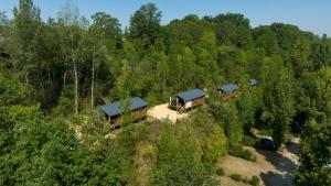 an aerial view of a house in the woods at Camping de la Bageasse in Brioude