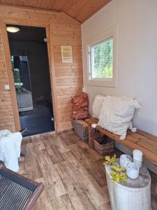 Χώρος καθιστικού στο Newly built cottages with jacuzzy and sauna
