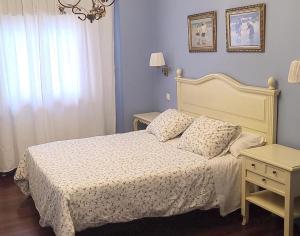 Postel nebo postele na pokoji v ubytování Hotel Kaia