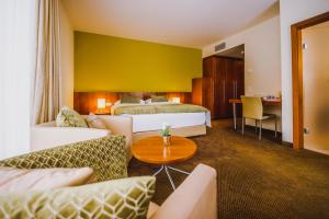 Postel nebo postele na pokoji v ubytování Seehotel Süd by S4Y