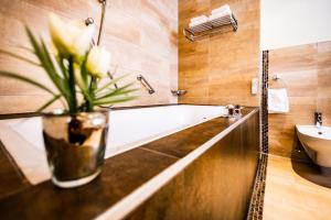 Phòng tắm tại Seehotel Süd by S4Y