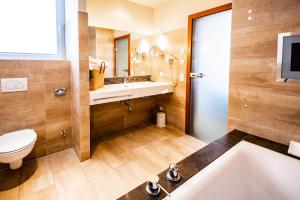 Phòng tắm tại Seehotel Süd by S4Y
