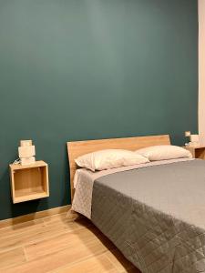 Postel nebo postele na pokoji v ubytování Antico Borgo Rooms