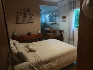 Ένα ή περισσότερα κρεβάτια σε δωμάτιο στο Sweet HOME +40 φωτογραφίες