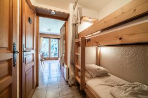 Postel nebo postele na pokoji v ubytování Studio Rez-de-jardin, 4 pers Chatel