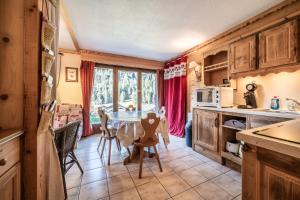 Kuchyň nebo kuchyňský kout v ubytování Appartement T3 Chatel