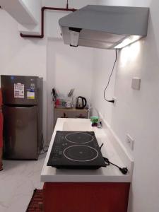Cucina o angolo cottura di M&M Royal Oceancrest Mactan