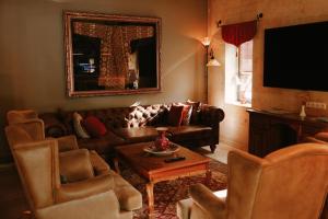 TV a/nebo společenská místnost v ubytování Heybe Hotel & Spa + 37 fotografií