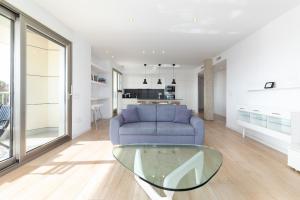 Posezení v ubytování ApartUP Patacona Deluxe