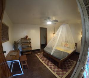 Postel nebo postele na pokoji v ubytování Sitio tourist inn