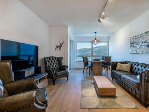Televízia a/alebo spoločenská miestnosť v ubytovaní Apartment Platzhirsch alpe maritima Ski & See - 23 by Interhome + 24 fotografií