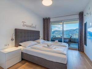 Posteľ alebo postele v izbe v ubytovaní Apartment Platzhirsch alpe maritima Ski & See - 23 by Interhome