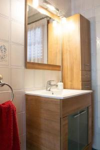 a bathroom with a sink and a mirror at villa costa blanca, privada para 12 personas y cerca playa Muchavista in San Juan de Alicante
