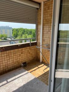 a view from the outside of a balcony at Apartment in Mainz-Lerchenberg in Mainz