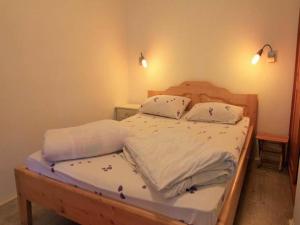 Postel nebo postele na pokoji v ubytování Guest House 3M