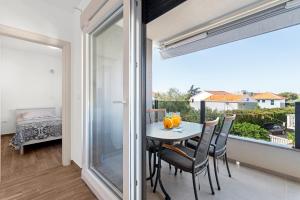 Balkón alebo terasa v ubytovaní Apartments Boomerang + 19 fotografií