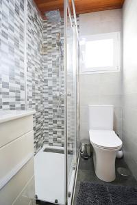 Et badeværelse på GALIHOST - Apartamento con vistas en Pedras Negras