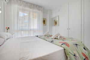 Posteľ alebo postele v izbe v ubytovaní Erisa 59 By IVI Real Estate