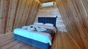 Postel nebo postele na pokoji v ubytování Patya BUNGALOV + 37 fotografií