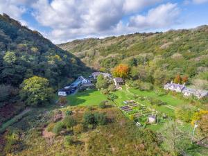 an aerial view of a house on a hill at Wisteria Lodge - Qc1677 in Cilgwm
