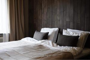 Postel nebo postele na pokoji v ubytování Steel Hotel
