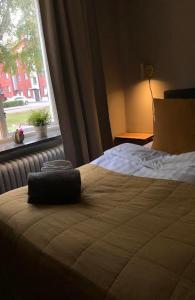 Postel nebo postele na pokoji v ubytování Steel Hotel