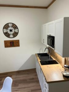 Kuchyň nebo kuchyňský kout v ubytování Egrensis Apartments