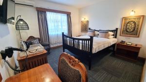 Giường trong phòng chung tại Winner Inn