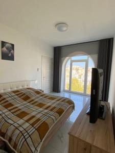 A bed or beds in a room at Lovely 1-bedroom in St Julians