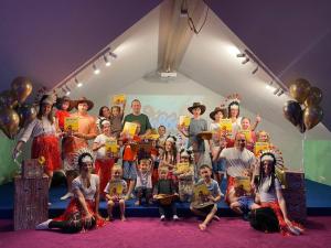 a group of people posing for a picture on a stage at Ведмежа гора Family Resort & Spa in Yaremche